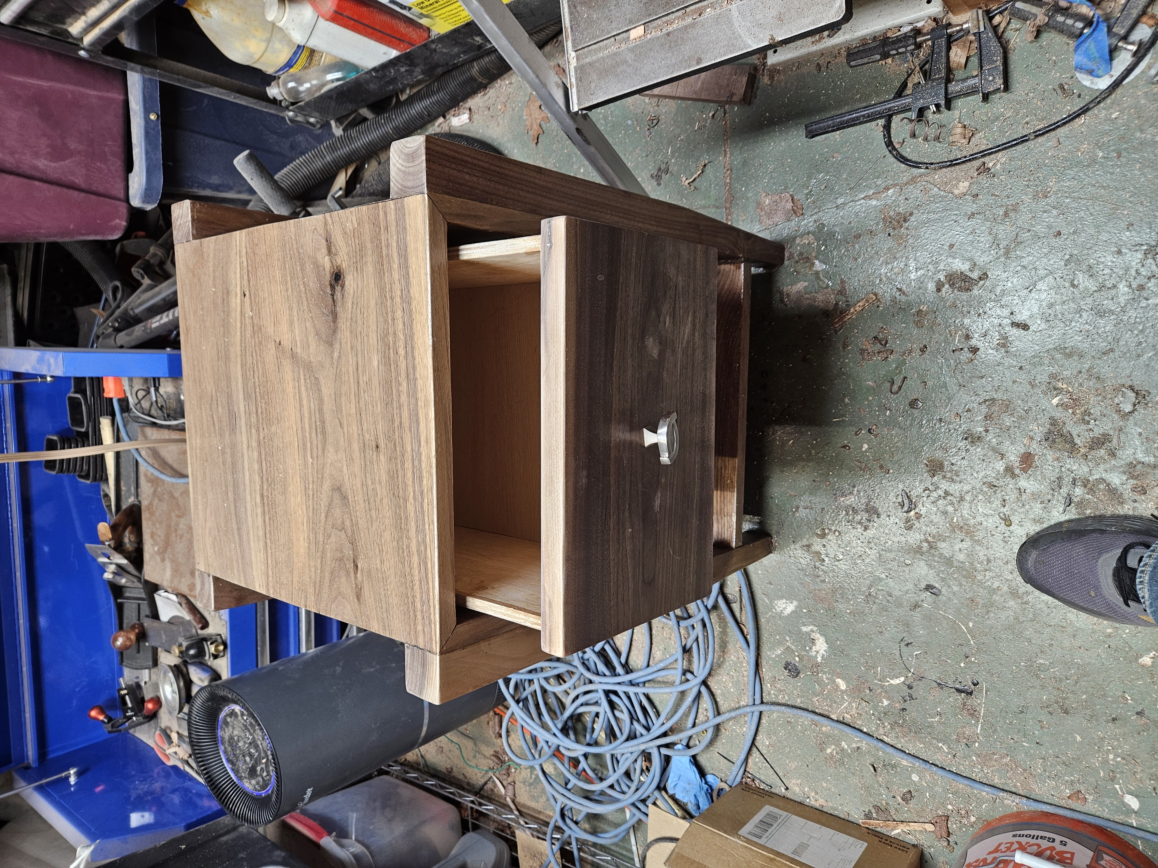 Nightstand with the drawer pulled open